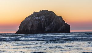 Preview wallpaper island, rock, sea, waves, dusk, landscape