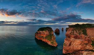 Preview wallpaper island, rock, sea, horizon, sky