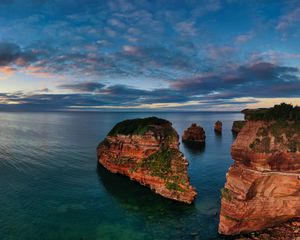 Preview wallpaper island, rock, sea, horizon, sky