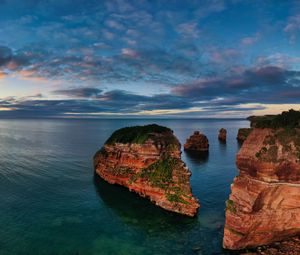 Preview wallpaper island, rock, sea, horizon, sky