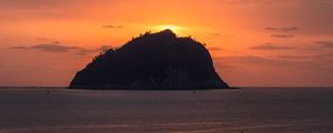 Preview wallpaper island, rock, sunset, sea, dusk, landscape