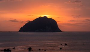 Preview wallpaper island, rock, sunset, sea, dusk, landscape