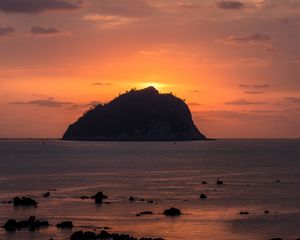 Preview wallpaper island, rock, sunset, sea, dusk, landscape