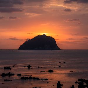 Preview wallpaper island, rock, sunset, sea, dusk, landscape