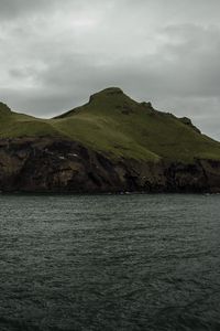 Preview wallpaper island, rocks, sea, grass