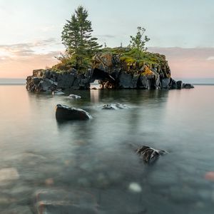 Preview wallpaper island, rocks, sea, trees, arch