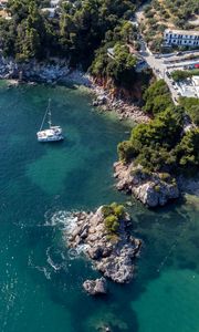 Preview wallpaper island, rocks, sea, water, boat, aerial view