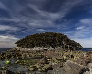 Preview wallpaper island, rocks, stones, clouds, sky