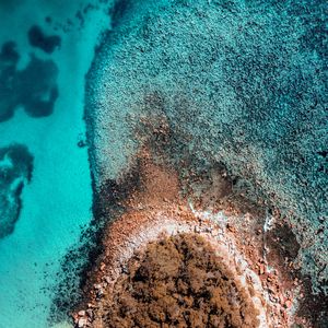 Preview wallpaper island, sea, aerial view, stones, water, shore