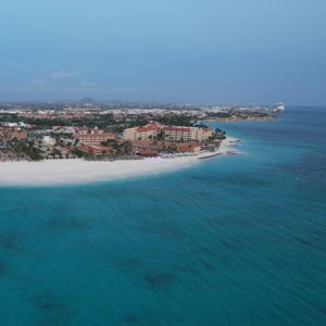 Preview wallpaper island, sea, buildings, coast, nature