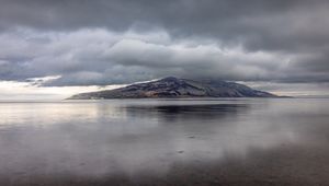 Preview wallpaper island, sea, clouds, water, reflection