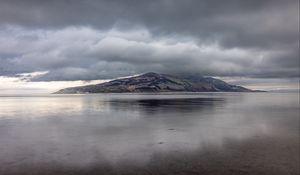 Preview wallpaper island, sea, clouds, water, reflection