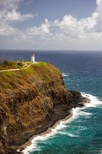 Preview wallpaper island, sea, lighthouse, coast, cliff