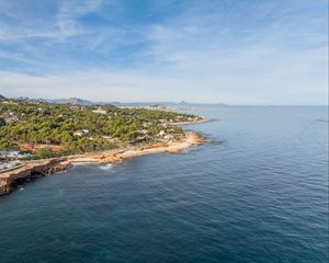 Preview wallpaper island, sea, trees, buildings, sky, nature