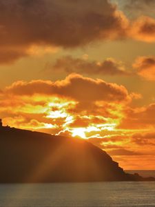 Preview wallpaper island, sunset, clouds, landscape, dark