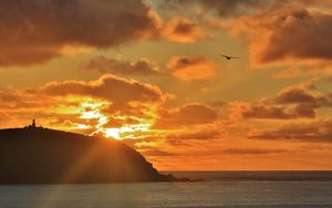 Preview wallpaper island, sunset, clouds, landscape, dark