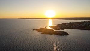 Preview wallpaper island, sunset, sea, sun, aerial view