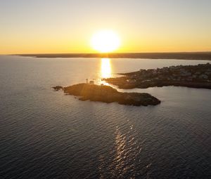 Preview wallpaper island, sunset, sea, sun, aerial view