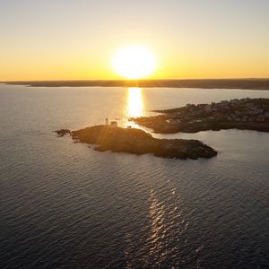 Preview wallpaper island, sunset, sea, sun, aerial view