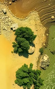 Preview wallpaper island, trees, sea, aerial view, stones