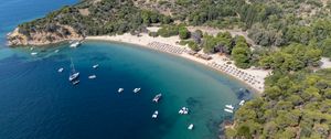 Preview wallpaper island, trees, sea, boats, aerial view