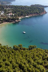 Preview wallpaper island, trees, sea, boat, aerial view