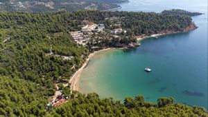 Preview wallpaper island, trees, sea, boat, aerial view