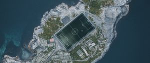 Preview wallpaper island, water, aerial view, football field, playground