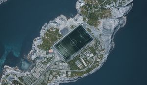 Preview wallpaper island, water, aerial view, football field, playground