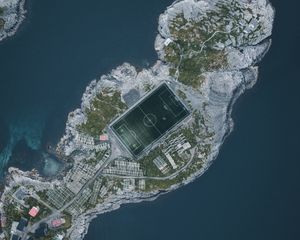 Preview wallpaper island, water, aerial view, football field, playground