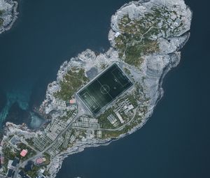 Preview wallpaper island, water, aerial view, football field, playground