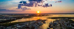 Preview wallpaper islands, buildings, river, dawn, bay