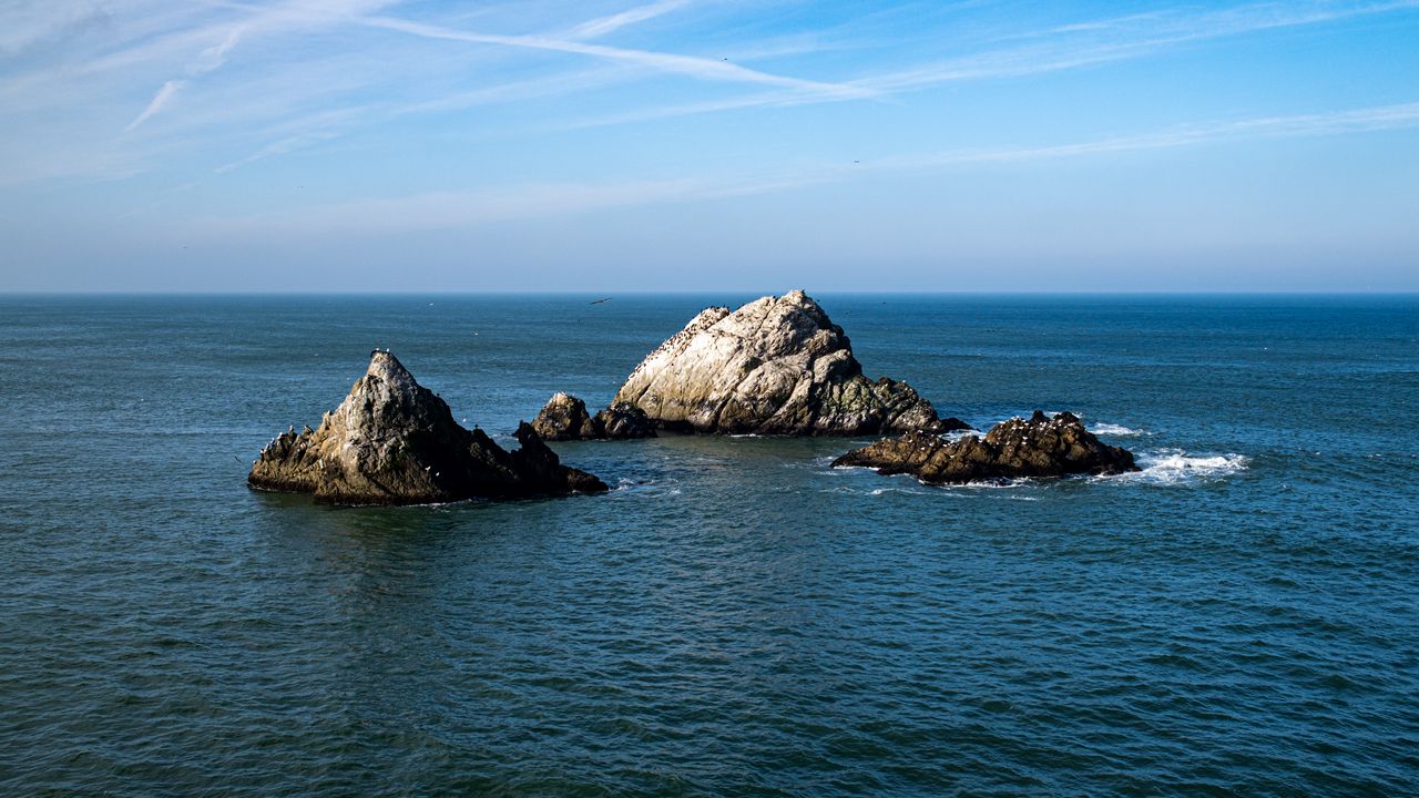 Wallpaper islands, rocks, sea, stones, water, horizon, nature