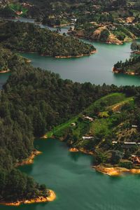 Preview wallpaper islands, water, aerial view, buildings, forest, coast