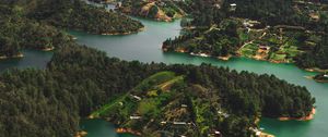 Preview wallpaper islands, water, aerial view, buildings, forest, coast