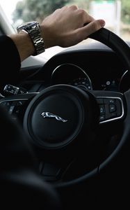 Preview wallpaper jaguar, steering wheel, hand, watch
