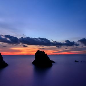 Preview wallpaper japan, shizuoka prefecture, island, beach, cliffs, ocean, calm, evening, orange, sunset, blue, sky, clouds