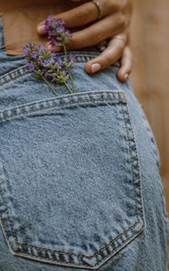 Preview wallpaper jeans, pocket, flowers, hand, ring