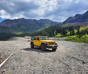 Preview wallpaper jeep, car, suv, yellow, mountains, nature