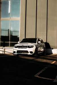 Preview wallpaper jeep, car, suv, white, building, parking