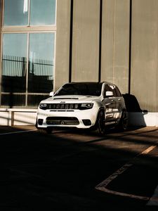 Preview wallpaper jeep, car, suv, white, building, parking