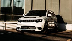 Preview wallpaper jeep, car, suv, white, building, parking