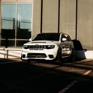 Preview wallpaper jeep, car, suv, white, building, parking