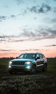 Preview wallpaper jeep grand cherokee, jeep, car, suv, gray, field, twilight