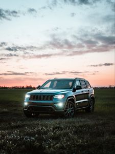 Preview wallpaper jeep grand cherokee, jeep, car, suv, gray, field, twilight