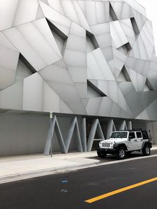 Preview wallpaper jeep, suv, side view, building, architecture