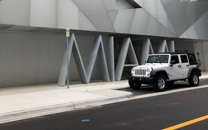 Preview wallpaper jeep, suv, side view, building, architecture