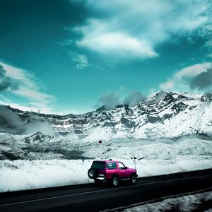 Preview wallpaper jeep, suv, side view, road, mountains, snow