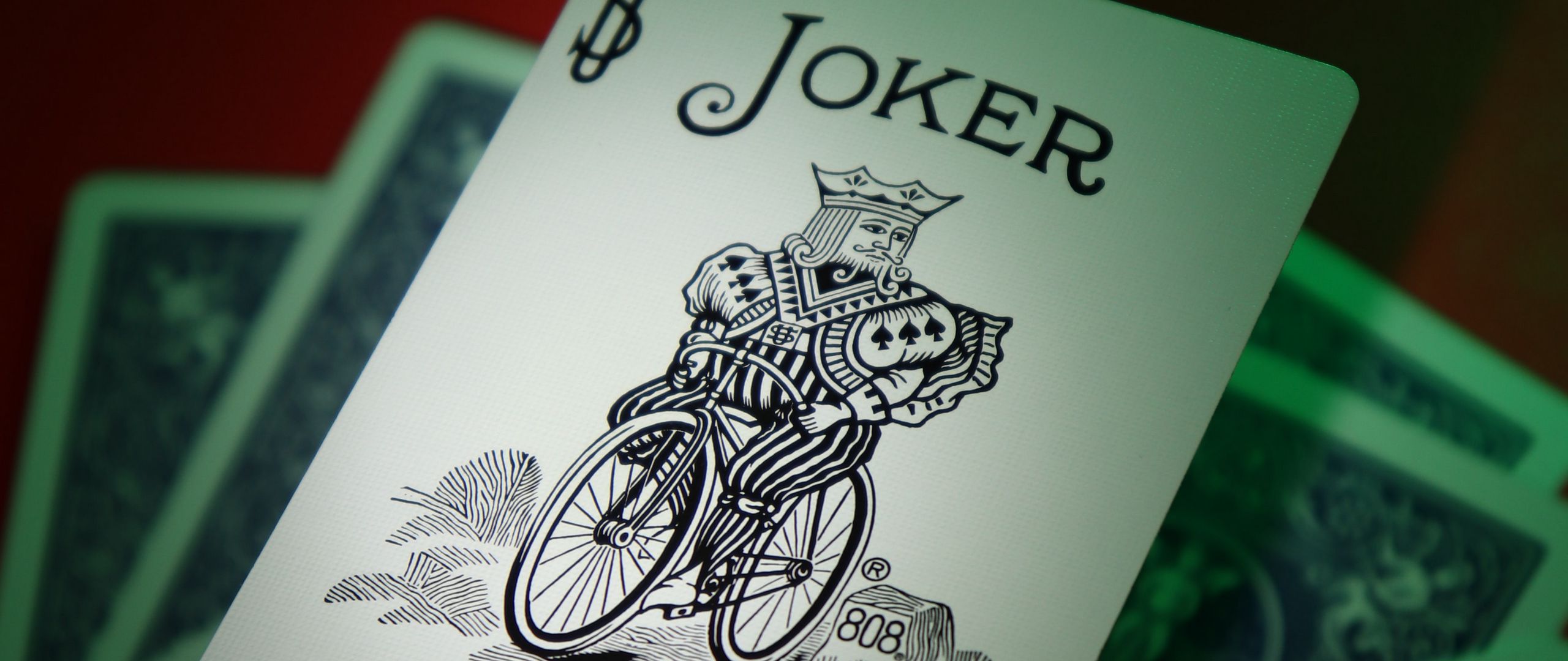 2560x1080 Wallpaper joker, word, inscription, cards