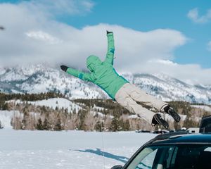 Preview wallpaper jump, car, mountains, snow
